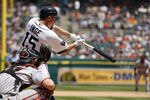 DETROIT - JULY 03: Brandon Inge #15 of the Detroit Tigers triples in the eight inning scoring teammates Alex Avila #13 and Ramon Santiago #39 during the game against the San Francisco Giants at Comerica Park on July 3, 2011 in Detroit, Michigan. The Tigers defeated the Giants 6-3.  (Photo by Leon Halip/Getty Images)