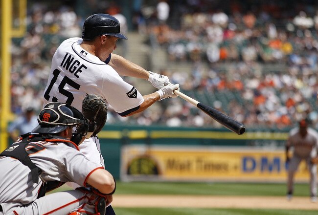 DETROIT - JULY 03: Brandon Inge #15 of the Detroit Tigers triples in the eight inning scoring teammates Alex Avila #13 and Ramon Santiago #39 during the game against the San Francisco Giants at Comerica Park on July 3, 2011 in Detroit, Michigan. The Tigers defeated the Giants 6-3.  (Photo by Leon Halip/Getty Images)