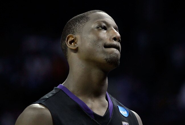CHARLOTTE, NC - MARCH 20:  Darnell Gant #44 of the Washington Huskies reacts after the Huskies were defeated 86-83 by the North Carolina Tar Heels during the third round of the 2011 NCAA men's basketball tournament at Time Warner Cable Arena on March 20, 2011 in Charlotte, North Carolina.  (Photo by Kevin C. Cox/Getty Images)