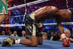 LAS VEGAS, NV - JULY 23:  Zab Judah lays on the mat as referee Vic Drakulich counts before Judah is knocked out in the fifth round by Amir Khan during their super lightweight world championship unification bout at Mandalay Bay Events Center on July 23, 2011 in Las Vegas, Nevada.  (Photo by Scott Heavey/Getty Images)