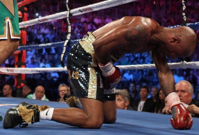 LAS VEGAS, NV - JULY 23:  Zab Judah lays on the mat as referee Vic Drakulich counts before Judah is knocked out in the fifth round by Amir Khan during their super lightweight world championship unification bout at Mandalay Bay Events Center on July 23, 2011 in Las Vegas, Nevada.  (Photo by Scott Heavey/Getty Images)