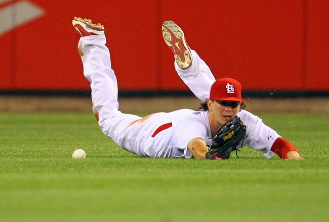 ST. LOUIS, MO - JUNE 1: Colby Rasmus #28 of the St. Louis Cardinals mis plays a fly ball against the San Francisco Giants at Busch Stadium on June 1, 2011 in St. Louis, Missouri.  (Photo by Dilip Vishwanat/Getty Images)