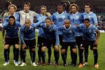 DUBLIN, IRELAND - MARCH 29:  Uruguay team line up for a team photo during the International Friendly match between Republic of Ireland and Uruguay at the Aviva Stadium on March 29, 2011 in Dublin, Ireland.  (Photo by Ian Walton/Getty Images)