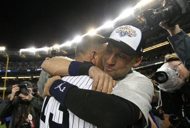 NEW YORK - NOVEMBER 04:  Derek Jeter #2 and Alex Rodriguez #13 of the New York Yankees celebrate on the field after their 7-3 win against the Philadelphia Phillies in Game Six of the 2009 MLB World Series at Yankee Stadium on November 4, 2009 in the Bronx borough of New York City.  (Photo by Nick Laham/Getty Images)