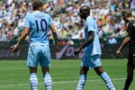 CARSON, CA - JULY 24:  Edin Dzeko #10 of Manchester City has words with teammate Mario Balotelli #45 after blasting the ball into the net he inexplicably tried to score with a spinning backheel which went wide of the target against the Los Angeles Galaxy during the Herbalife World Football Challenge 2011 at the Home Depot Center on July 24, 2011 in Carson, California.  (Photo by Kevork Djansezian/Getty Images)