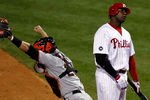 PHILADELPHIA - OCTOBER 23:  Ryan Howard #6 of the Philadelphia Phillies strikes out to end the game and lose as Buster Posey #25 of the San Francisco Giants celebrates in Game Six of the NLCS during the 2010 MLB Playoffs at Citizens Bank Park on October 23, 2010 in Philadelphia, Pennsylvania.  (Photo by Jeff Zelevansky/Getty Images)