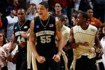 NEW ORLEANS - MARCH 18:  Tony Woods #55 of the Wake Forest Demon Deacons celebrates after defeating the Texas Longhorns 81-80 in overtime during the first round of the 2010 NCAA men�s basketball tournament at the New Orleans Arena on March 18, 2010 in New Orleans, Louisiana.  (Photo by Chris Graythen/Getty Images)