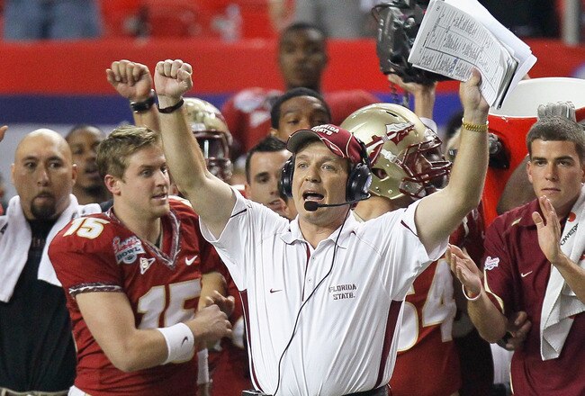 ATLANTA, GA - DECEMBER 31:  Head coach Jimbo Fisher and the Florida State Seminoles sideline reacts after getting a first down in the final seconds of their 26-17 win over the South Carolina Gamecocks during the 2010 Chick-fil-A Bowl at Georgia Dome on December 31, 2010 in Atlanta, Georgia.  (Photo by Kevin C. Cox/Getty Images)