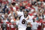 GLENDALE, AZ - DECEMBER 12:  Quarterback Kyle Orton #8 of the Denver Broncos throws a pass during the NFL game against the Arizona Cardinals at the University of Phoenix Stadium on December 12, 2010 in Glendale, Arizona.  (Photo by Christian Petersen/Getty Images)