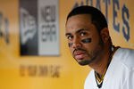 PITTSBURGH - APRIL 07:  Pedro Alvarez #24 of the Pittsburgh Pirates watches the game from the dugout against the Colorado Rockies during the Opening Day game on April 7, 2011 at PNC Park in Pittsburgh, Pennsylvania.  (Photo by Jared Wickerham/Getty Images)