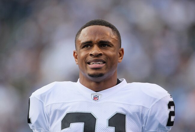 SAN DIEGO - DECEMBER 05:  Nnamdi Asomugha #21 the Oakland Raiders looks on from the sideline against the San Diego Chargers at Qualcomm Stadium on December 5, 2010 in San Diego, California. The Raiders defeated the Chargers 28-13.  (Photo by Jeff Gross/Getty Images)