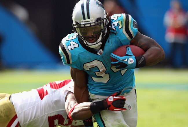 CHARLOTTE, NC - OCTOBER 24:  DeAngelo Williams #34 of the Carolina Panthers runs with the ball against the San Francisco 49ers during their game at Bank of America Stadium on October 24, 2010 in Charlotte, North Carolina.  (Photo by Streeter Lecka/Getty Images)