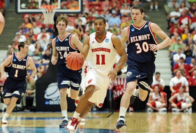TUCSON, AZ - MARCH 17:  Jordan Taylor #11 of the Wisconsin Badgers drives down court in front of Trevor Noack #30 and Mick Hedgepeth #34 of the Belmont Bruins during the second round of the 2011 NCAA men's basketball tournament at McKale Center on March 17, 2011 in Tucson, Arizona.  (Photo by Harry How/Getty Images)