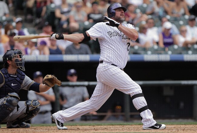 DENVER, CO - JULY 17:  Jason Giambi #23 of the Colorado Rockies watches his homerun against the Milwaukee Brewers at Coors Field on July 17, 2011 in Denver, Colorado.  (Photo by Doug Pensinger/Getty Images)