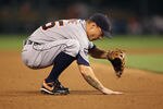 KANSAS CITY, MO - JULY 07:  Brandon Inge #15 of the Detroit Tigers rubs the dirt during the game against the Kansas City Royals on July 7, 2011 at Kauffman Stadium in Kansas City, Missouri.  (Photo by Jamie Squire/Getty Images)
