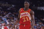 INGLEWOOD, CA - 1989:  Dominique Wilkins #21 of the Atlanta Hawks stands on the court during a NBA game against the Los Angeles Lakers at the Great Western Forum in Inglewood, California in 1989.  (Photo by Ken Levine/Getty Images)