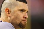 ST. LOUIS, MO - JULY 5: Jonny Gomes #31 of the Cincinnati Reds looks on from the dugout against the St. Louis Cardinals at Busch Stadium on July 5, 2011 in St. Louis, Missouri.  (Photo by Dilip Vishwanat/Getty Images)