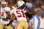 SAN DIEGO, CA - DECEMBER 16:  Linebacker Takeo Spikes #51 of the San Francisco 49ers hits tight end Randy McMichael #81 of the San Diego Chargers during their game at Qualcomm Stadium on December 16, 2010 in San Diego, California.  (Photo by Donald Miralle/Getty Images)