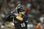 PHOENIX, AZ - JULY 24:  Ryan Spilborghs #19 of the Colorado Rockies bats against the Arizona Diamondbacks during the Major League Baseball game at Chase Field on July 24, 2011 in Phoenix, Arizona.  The Diamondbacks defeated the Rockies 7-0.  (Photo by Christian Petersen/Getty Images)