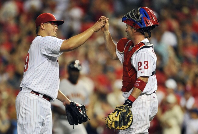 PHILADELPHIA, PA - JULY 26: Starting pitcher Vance Worley #49 of the Philadelphia Phillies high-fives teammate Brian Schneider #23 after pitching a complete game and defeating the San Francisco Giants 7-2 at Citizens Bank Park on July 26, 2011 in Philadelphia, Pennsylvania. (Photo by Drew Hallowell/Getty Images)