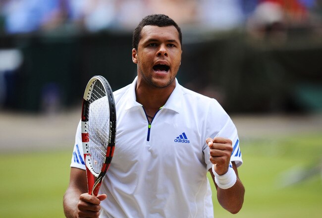 LONDON, ENGLAND - JULY 01:  Jo-Wilfried Tsonga of France reacts to a play during his semifinal round match against Novak Djokovic of Serbia on Day Eleven of the Wimbledon Lawn Tennis Championships at the All England Lawn Tennis and Croquet Club on July 1, 2011 in London, England.  (Photo by Clive Mason/Getty Images)