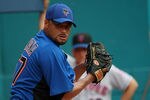 MIAMI GARDENS, FL - JULY 24:  Johan Santana #57 of the New York Mets pitches in the bullpen as Manager Terry Collins #10 looks on during a throwing session before a game against the Florida Marlins at Sun Life Stadium on July 24, 2011 in Miami Gardens, Florida.  (Photo by Sarah Glenn/Getty Images)