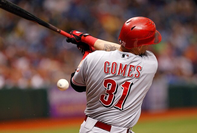 ST. PETERSBURG, FL - JUNE 29:  Designated hitter Jonny Gomes #31 of the Cincinnati Reds fouls off a pitch against the Tampa Bay Rays during the game at Tropicana Field on June 29, 2011 in St. Petersburg, Florida.  (Photo by J. Meric/Getty Images)