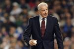 20 Oct 1996:  Baseball great Joe Dimaggio walks out to the pitchers mound to throw out the first pitch of the 1996 World Series Game One between the Atlanta Braves and the New York Yankees at Yankee Stadium in the Bronx, New York. The Braves defeated the Yankees 12-1. Mandatory Credit: Doug Pensinger  /Allsport