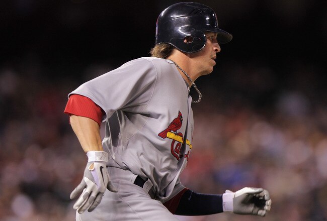 DENVER, CO - MAY 27:  Colby Rasmus #28 of the St. Louis Cardinals rounds the bases on his two RBI triple in the seventh inning to give the Cardinals a 8-3 lead over the Colorado Rockies at Coors Field on May 27, 2011 in Denver, Colorado.  (Photo by Doug Pensinger/Getty Images)