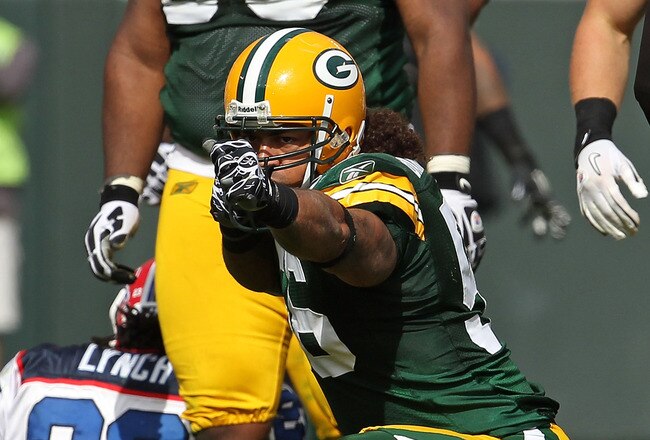 GREEN BAY, WI - SEPTEMBER 19: Nick Barnett #56 of the Green Bay Packers celebrates a defensive stop against Marshawn Lynch #23 of the Buffalo Bills at Lambeau Field on September 19, 2010 in Green Bay, Wisconsin. The Packers defeated the Bills 34-7. (Photo by Jonathan Daniel/Getty Images)