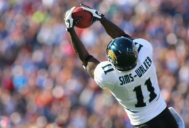 ORCHARD PARK, NY - OCTOBER 10:  Mike Sims-Walker #11 of the Jacksonville Jaguars makes a catch against the Buffalo Bills   at Ralph Wilson Stadium on October 10, 2010 in Orchard Park, New York. Jacksonville won 36-26. (Photo by Rick Stewart/Getty Images)