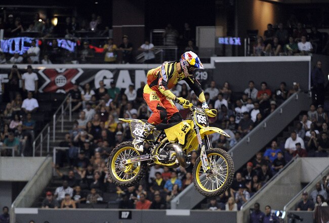 LOS ANGELES, CA - AUGUST 01:  Travis Pastrana competes to a gold medal in the Moto X Speed & Style Final during X Games 16 at Staples Center on August 1, 2010 in Los Angeles, California.  (Photo by Harry How/Getty Images)