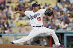 LOS ANGELES, CA - JULY 27:  Hiroki Kuroda #18 of the Los Angeles Dodgers pitches against the Colorado Rockies in the second inning at Dodger Stadium on July 27, 2011 in Los Angeles, California.  (Photo by Jeff Gross/Getty Images)