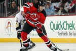 NEWARK, NJ - MARCH 04:  Brian Rolston #12 of the New Jersey Devils skates against the Pittsburgh Penguins at the Prudential Center on March 4, 2011 in Newark, New Jersey. The Devils defeated the Penguins 2-1 in overtime.  (Photo by Bruce Bennett/Getty Images)