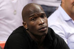 MIAMI, FL - MAY 24:  Chad 'Ochocinco' Johnson watches the Miami Heat play against the Chicago Bulls in Game Four of the Eastern Conference Finals during the 2011 NBA Playoffs on May 24, 2011 at American Airlines Arena in Miami, Florida. NOTE TO USER: User expressly acknowledges and agrees that, by downloading and or using this photograph, User is consenting to the terms and conditions of the Getty Images License Agreement.  (Photo by Mike Ehrmann/Getty Images)