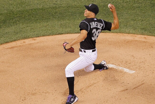 DENVER, CO - JULY 19:  Starting pitcher Ubaldo Jimenez #38 of the Colorado Rockies works the first inning against the Atlanta Braves at Coors Field on July 19, 2011 in Denver, Colorado.  (Photo by Justin Edmonds/Getty Images)