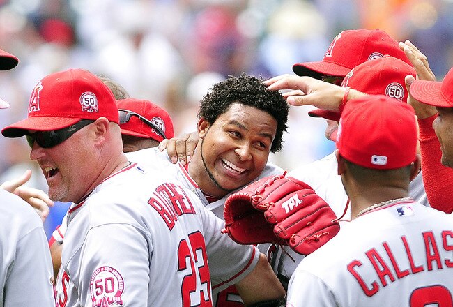CLEVELAND, OH - JULY 27: Starting pitcher Ervin Santana #54 of the Los Angeles Angels of Anaheim celebrates with his teammates after throwing a no-hitter against the Cleveland Indians at Progressive Field on July 27, 2011 in Cleveland, Ohio. The Angels defeated the Indians 3-1. (Photo by Jason Miller/Getty Images)