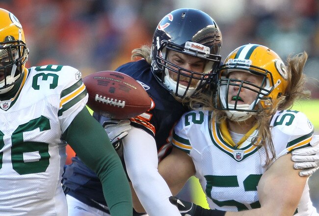 CHICAGO, IL - JANUARY 23:  (C) Tight end Greg Olsen #82 of the Chicago Bears knocks down a pass intended for him that was nearly intercepted by Nick Collins #36 and Clay Matthews #52 of the Green Bay Packers in the second quarter in the NFC Championship Game at Soldier Field on January 23, 2011 in Chicago, Illinois.  (Photo by Andy Lyons/Getty Images)