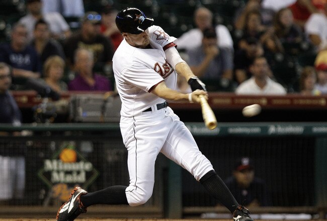 HOUSTON, TX - JULY 20: Hunter Pence #9 of the Houston Astros hits a triple in the first inning against  the Washington Nationals on July 20, 2011 at Minute Maid Park in Houston, Texas. Astros won in the bottom of the 11th 3 - 2. (Photo by Thomas B. Shea/Getty Images)