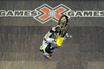 LOS ANGELES, CA - JULY 28:  Travis Pastrana attempts his jump in the Moto X Best Trick Final during day 1 of the X Games 17 at the Staples Centrer on July 28, 2011 in Los Angeles, California. Pastrana could not land his jump and left with an injury.  (Photo by Harry How/Getty Images)