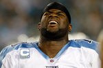 JACKSONVILLE, FL - OCTOBER 18:  Quarterback Vince Young #10 of the Tennessee Titans grimaces in pain during the first quarter against the Jacksonville Jaguars during the game at EverBank Field on October 18, 2010 in Jacksonville, Florida.  (Photo by J. Meric/Getty Images)