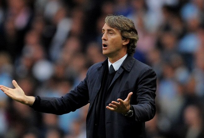 MANCHESTER, UNITED KINGDOM - MAY 10:  Manchester City Manager Roberto Mancini reacts during the Barclays Premier League match between Manchester City and Tottenham Hotspur at the City of Manchester Stadium on May 10, 2011 in Manchester, England. (Photo by Michael Regan/Getty Images)