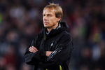 BARCELONA, SPAIN - APRIL 08:  (FILE PHOTO) Head coach Jurgen Klinsmann of Bayern Munich follows his players during the UEFA Champions League quarter final first leg match between FC Barcelona and FC Bayern Munich at the Camp Nou stadium on April 8, 2009 in Barcelona, Spain. Today former head coach Juergen Klinsmann and FC Bayern Muenchen AG announced the immediate ending of their contract, which was supposed to last until 30 June 2010.  (Photo by Jasper Juinen/Getty Images)