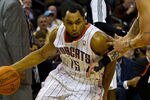 CHARLOTTE, NC - JANUARY 03: Gerald Henderson #15 of the Charlotte Bobcats drives the baseline past Mike Miller #13 of the Miami Heat at Time Warner Cable Arena on January 3, 2011 in Charlotte, North Carolina.  The Heat defeated the Bobcats 96-82.  (Photo by Brian A. Westerholt/Getty Images)