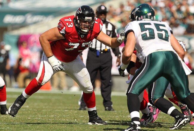PHILADELPHIA - OCTOBER 17:  Harvey Dahl #73 of the Atlanta Falcons in action against Stewart Bradley #55 of the Philadelphia Eagles during their game at Lincoln Financial Field on October 17, 2010 in Philadelphia, Pennsylvania.  (Photo by Al Bello/Getty Images)