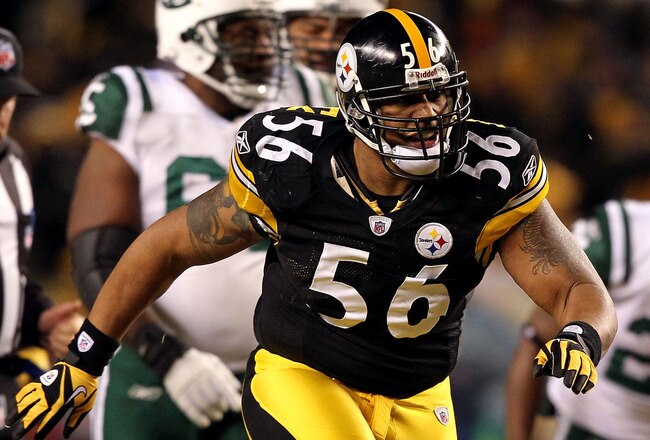 PITTSBURGH, PA - JANUARY 23:  LaMarr Woodley #56 of the Pittsburgh Steelers reacts after a sack against the New York Jets during the 2011 AFC Championship game at Heinz Field on January 23, 2011 in Pittsburgh, Pennsylvania. The Steelers won 24-19. (Photo by Al Bello/Getty Images)