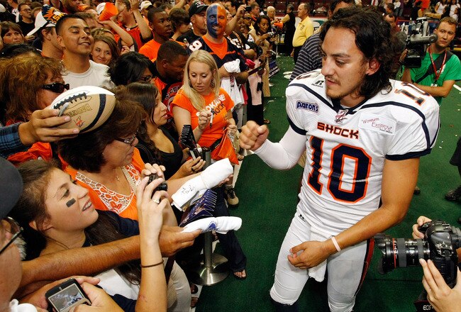 LAS VEGAS - AUGUST 22:  Quarterback Nick Davila #10 of the Spokane Shock greets fans after the team's 74-27 victory over the Wilkes-Barre/Scranton Pioneers in the AFL2 ArenaCup 10 at the Orleans Arena August 22, 2009 in Las Vegas, Nevada.  (Photo by Ethan Miller/Getty Images)