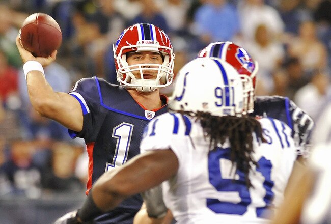 TORONTO - AUGUST 19:  Levi Brown #10 of the Buffalo Bills looks to pass with Ricardo Mathews #91 of the Indianapolis Colts defending during game action August 19, 2010 at the Rogers Centre in Toronto, Ontario, Canada. (Photo by Brad White/Getty Images)