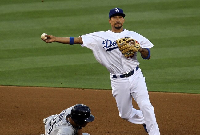 LOS ANGELES, CA - JULY 8:  Shortstop Rafael Furcal #15 of the Los Angeles Dodgers turns a double play after forcing out Will Venable #25 of the San Diego Padres in the third inning on July 8, 2011 at Dodger Stadium in Los Angeles, California.   (Photo by Stephen Dunn/Getty Images)