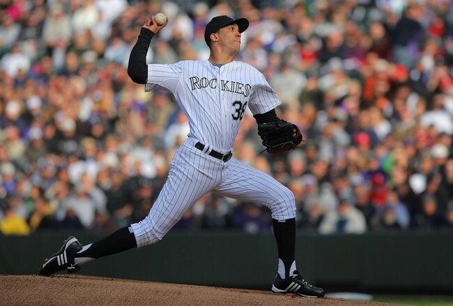 DENVER - OCTOBER 11:  Ubaldo Jimenez #38 of the Colorado Rockies pitches against the Philadelphia Phillies in Game Four of the NLDS during the 2009 MLB Playoffs at Coors Field on October 12, 2009 in Denver, Colorado.  (Photo by Doug Pensinger/Getty Images)